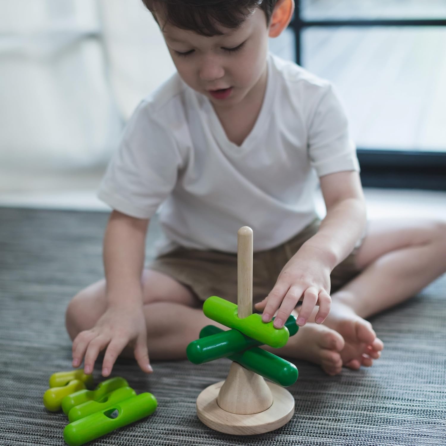 image:imagePlanToys Wooden Stacking Rocket Toy for Toddlers  Montessori Educational STEM Learning Toy  Colorful Wooden Rocket Ship Stacker for Fine Motor Skills Problem Solving Preschool GiftStacking Tree