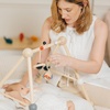 image:imagePlanToys Play Gym Wooden Baby Activity Toy in Pastel Colours  Montessori Sensory Play for Motor Skills Coordination amp Focus  EcoFriendly Developmental GymBlack  Red  White