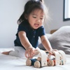 image:imagePlanToys Vroom Car Wooden Push Toy for Toddlers  EcoFriendly Toddler Push Car for Indoor Play  Montessori Fine Motor Learning Toys for KidsVroom Truck