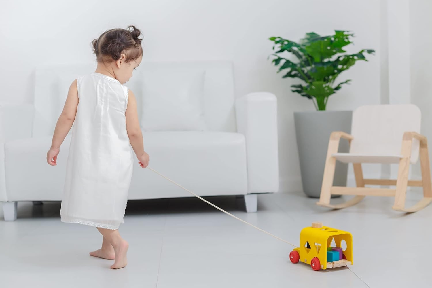 image:imagePlanToys Sorting Bus Pull Toy  Sustainably Made from Rubberwood Featuring OrganicPigment Coloring and WaterBased Dyes with 3 Colorful Shapes and PullAlong Bus