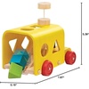 image:imagePlanToys Sorting Bus Pull Toy  Sustainably Made from Rubberwood Featuring OrganicPigment Coloring and WaterBased Dyes with 3 Colorful Shapes and PullAlong Bus